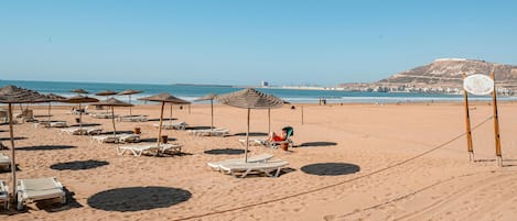 Private beach nearby, white sand, sun loungers, beach umbrellas