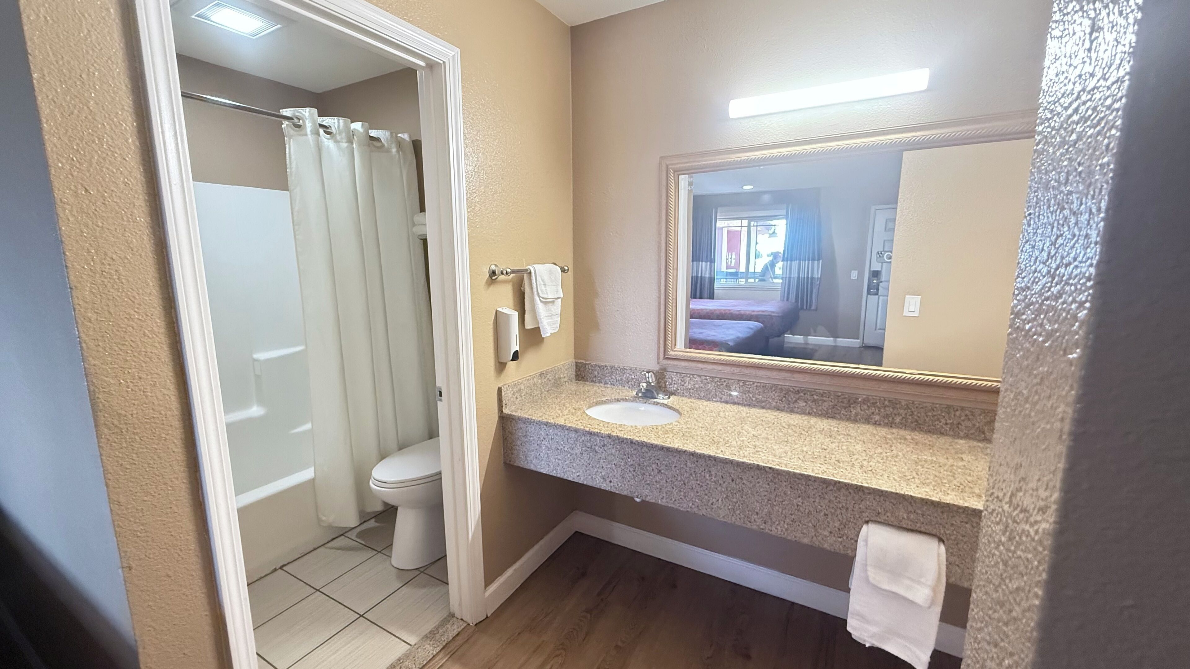 Standard Room, 2 Queen Beds, Non Smoking | Bathroom | Combined shower/tub, free toiletries, hair dryer (on request), towels