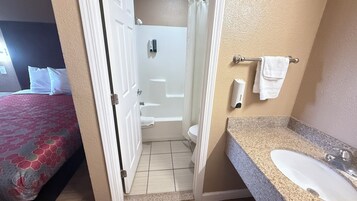 Standard Room, 2 Queen Beds, Non Smoking | Bathroom | Combined shower/tub, free toiletries, hair dryer, towels