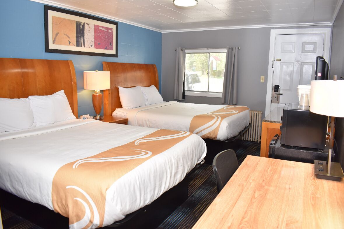 Standard Room, 2 Queen Beds | Iron/ironing board, free internet, bed sheets