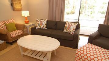 3 bedroom. 2 bath condo near beach | Living room | DVD player