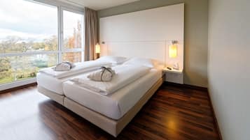 Suite | Hochwertige Bettwaren, Daunenbettdecken, Minibar, Zimmersafe