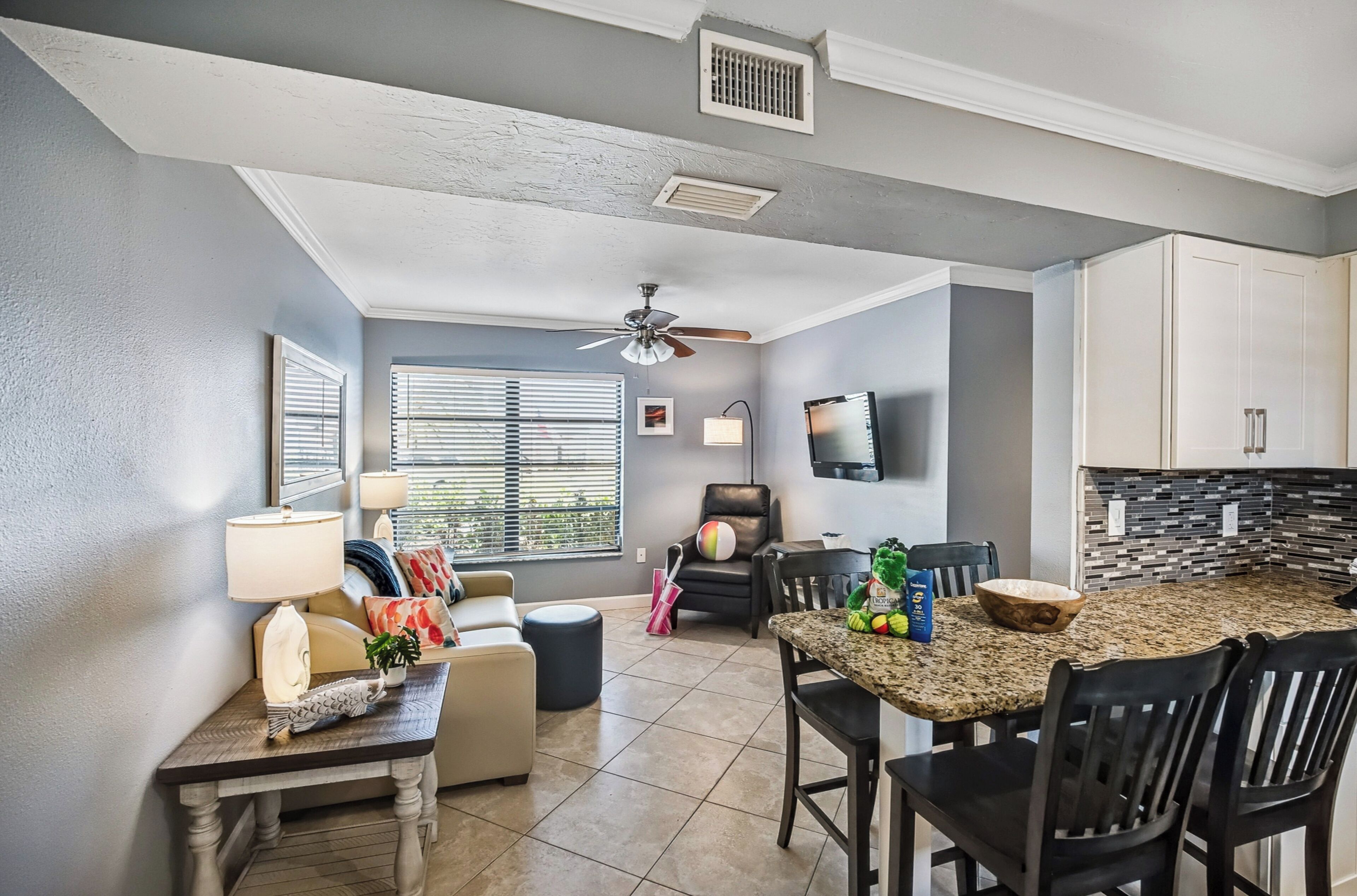 One Bedroom Suite Two Doubles | Living area | 32-inch flat-screen TV with cable channels, TV, DVD player