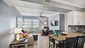 One Bedroom Suite Two Doubles | Living area | 32-inch flat-screen TV with cable channels, TV, DVD player