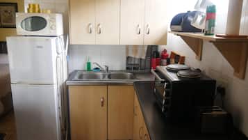 Family Room, 1 Bedroom (Khaya unit) | Private kitchen | Full-size fridge, microwave, oven, stovetop