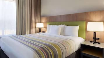Premium bedding, down duvets, pillow-top beds, in-room safe