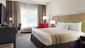 Premium bedding, down comforters, pillowtop beds, in-room safe