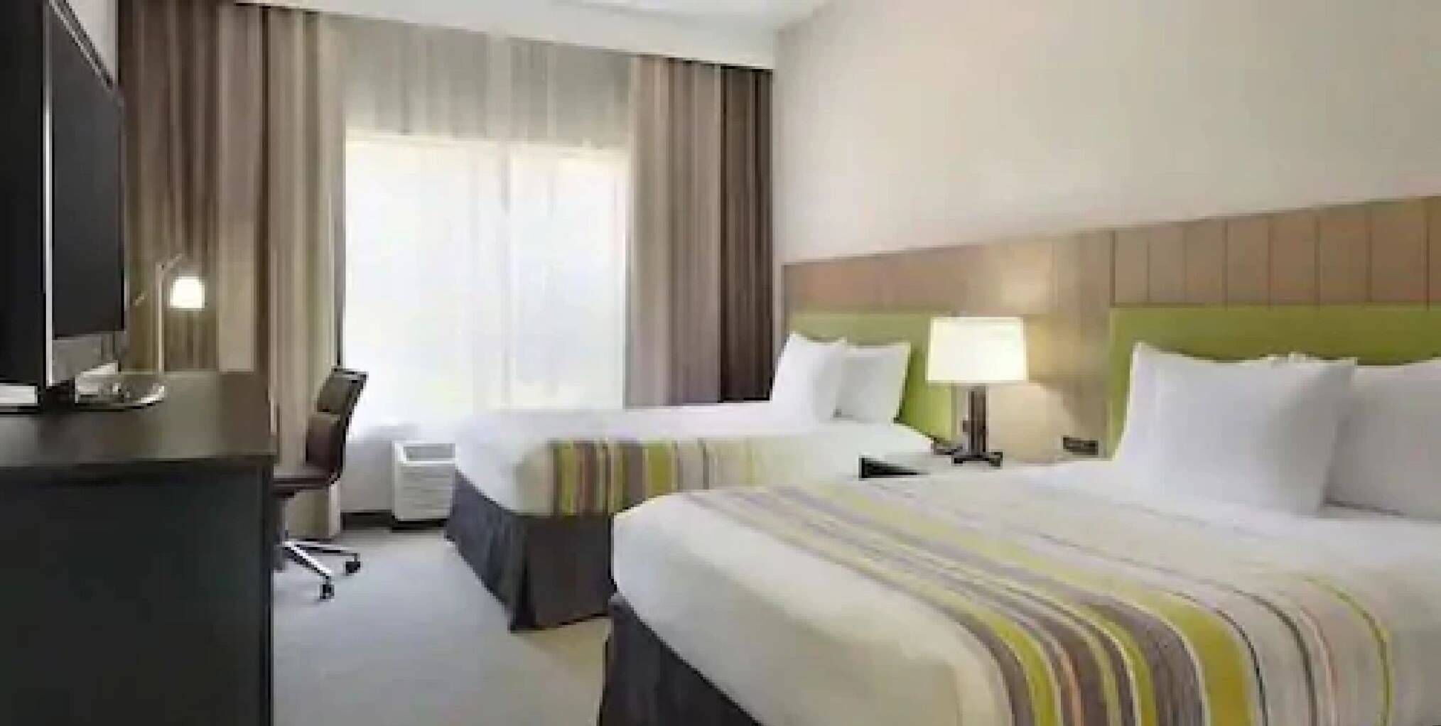 Premium bedding, down duvets, pillow-top beds, in-room safe