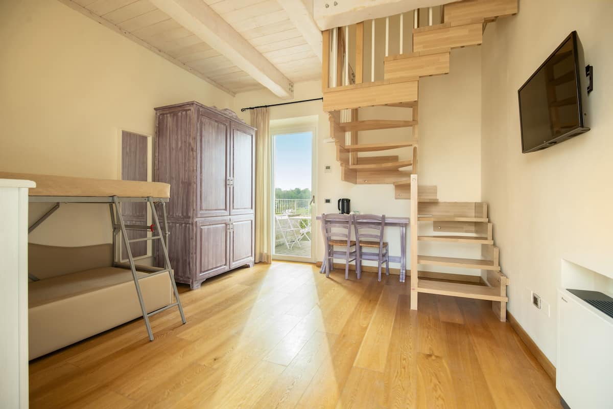 junior quadruple room | living area | 28-inch lcd tv with digital channels, tv