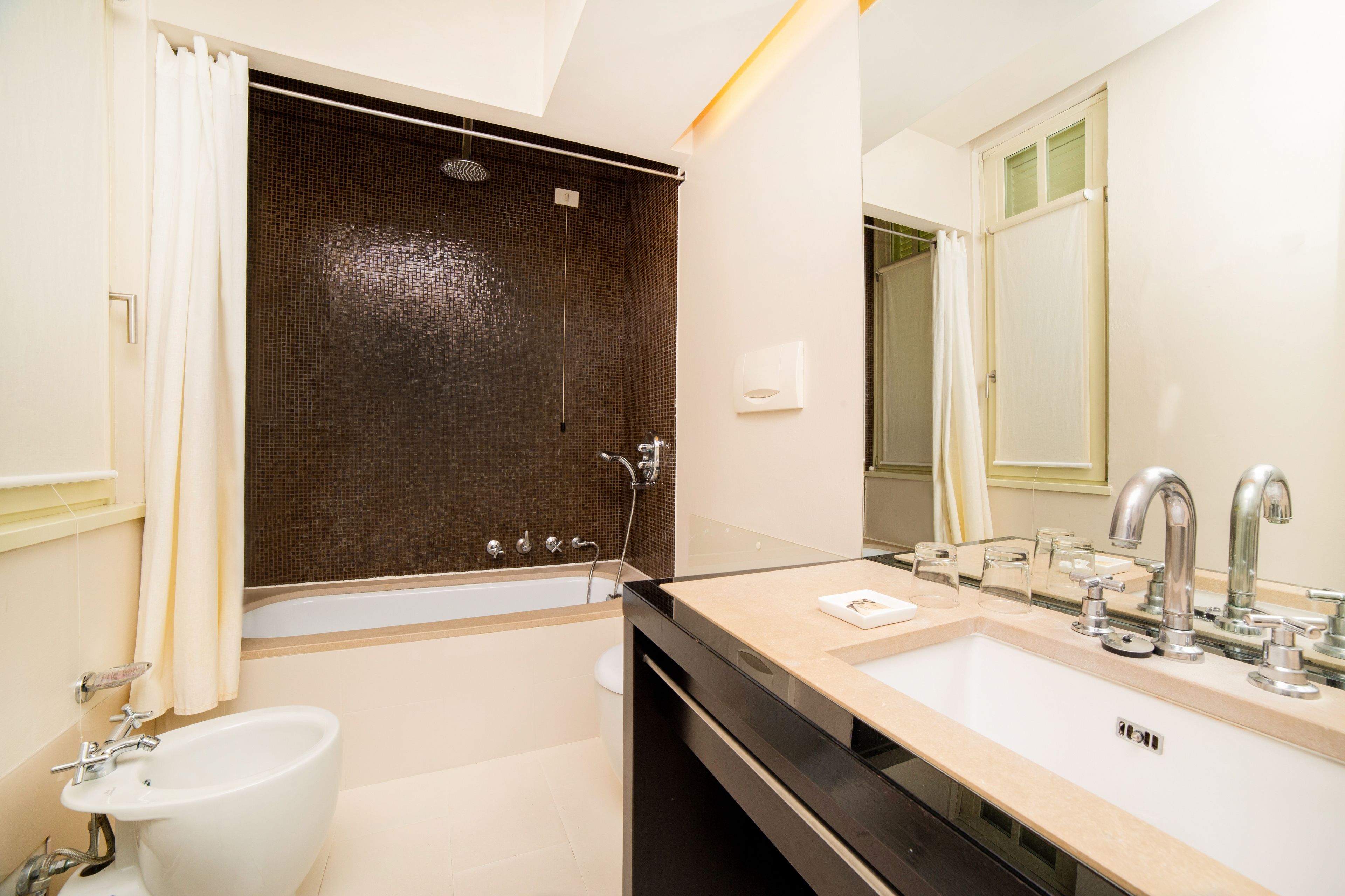 hair dryer, bathrobes, slippers, bidet