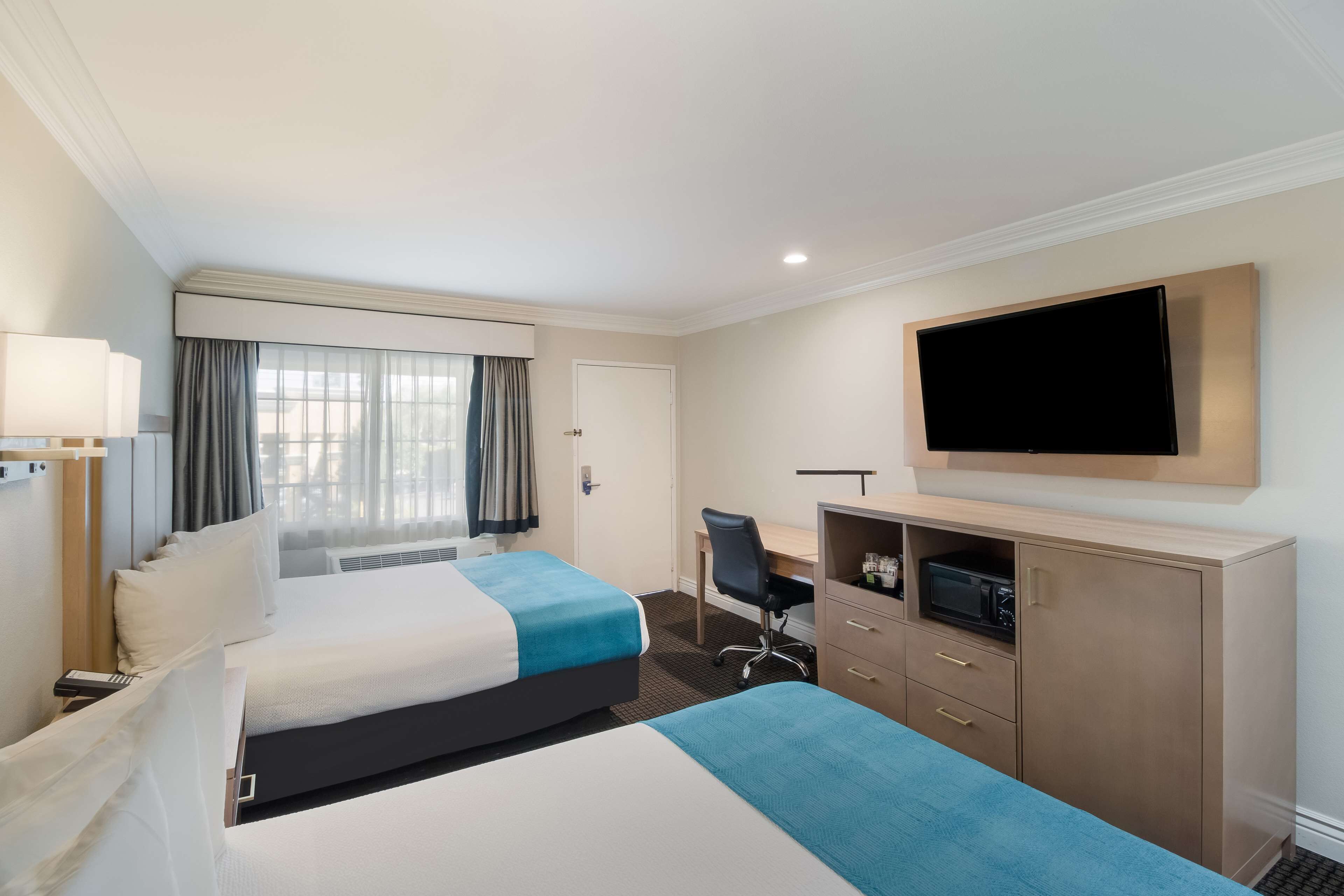 suite, 2 queen beds, non smoking, refrigerator & microwave | 1 bedroom, premium bedding, desk, blackout curtains