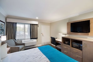 Premium bedding, desk, blackout curtains, iron/ironing board
