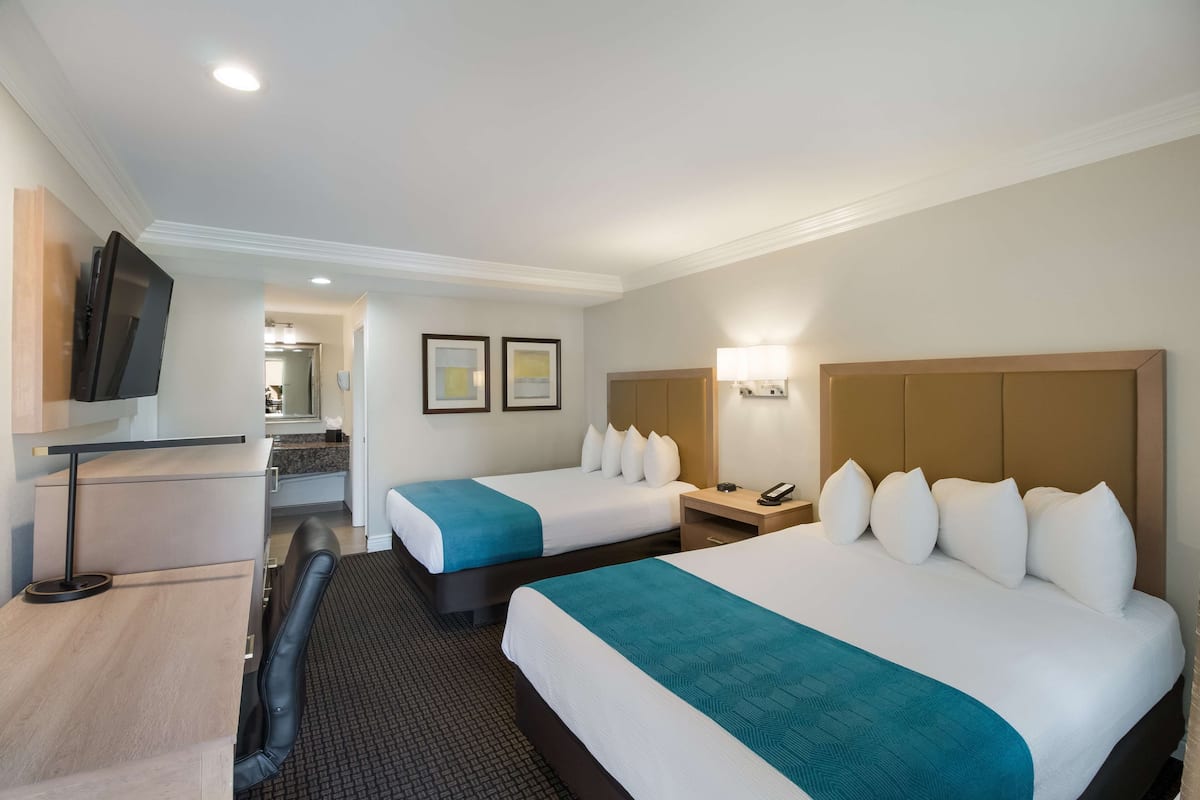 Premium bedding, desk, blackout curtains, iron/ironing board