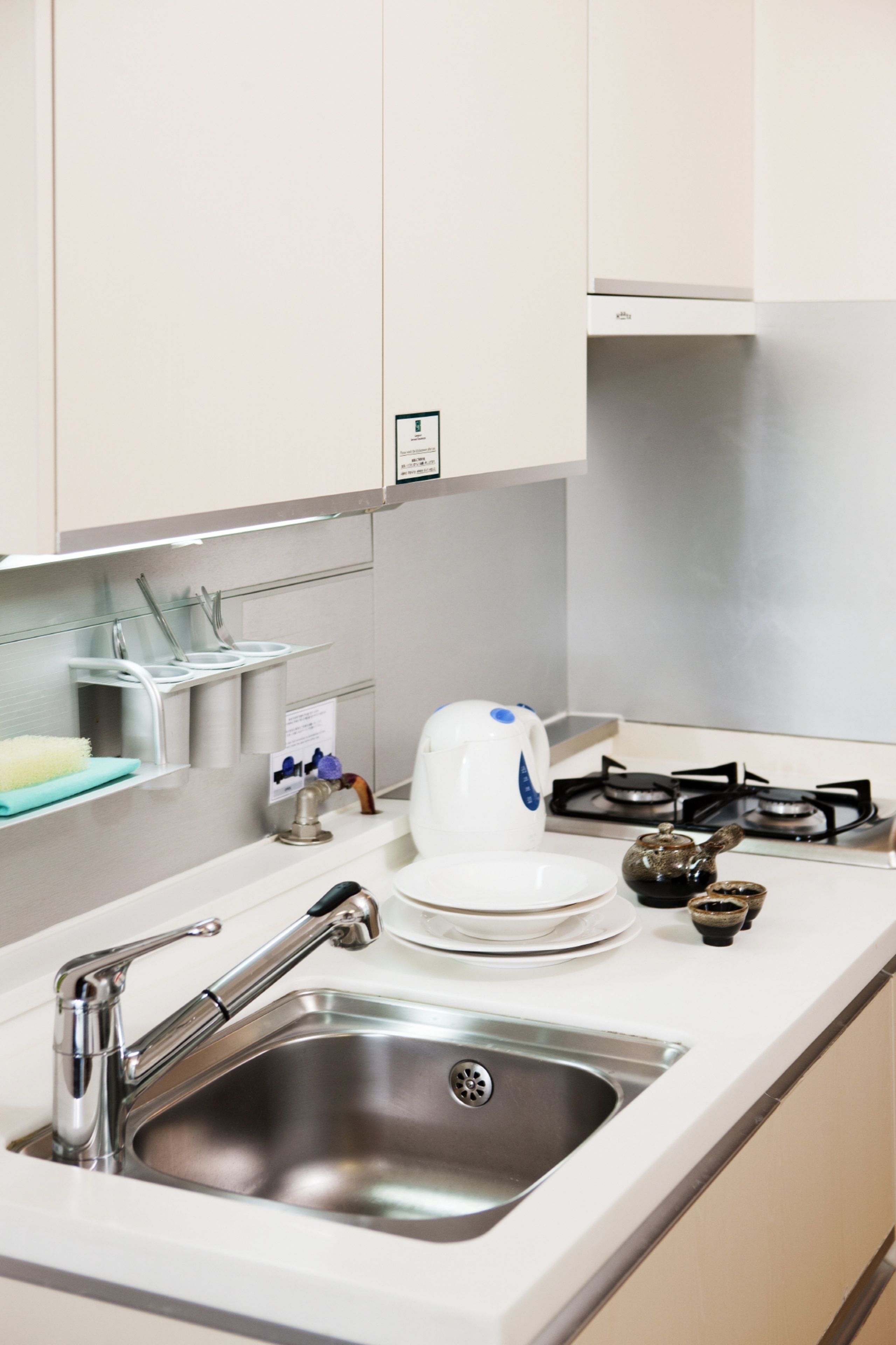 fridge, microwave, stovetop, electric kettle