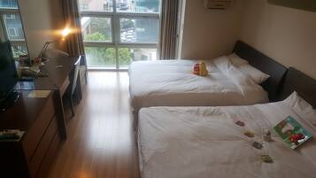 Family Twin Room | Individually furnished, desk, blackout drapes, free WiFi