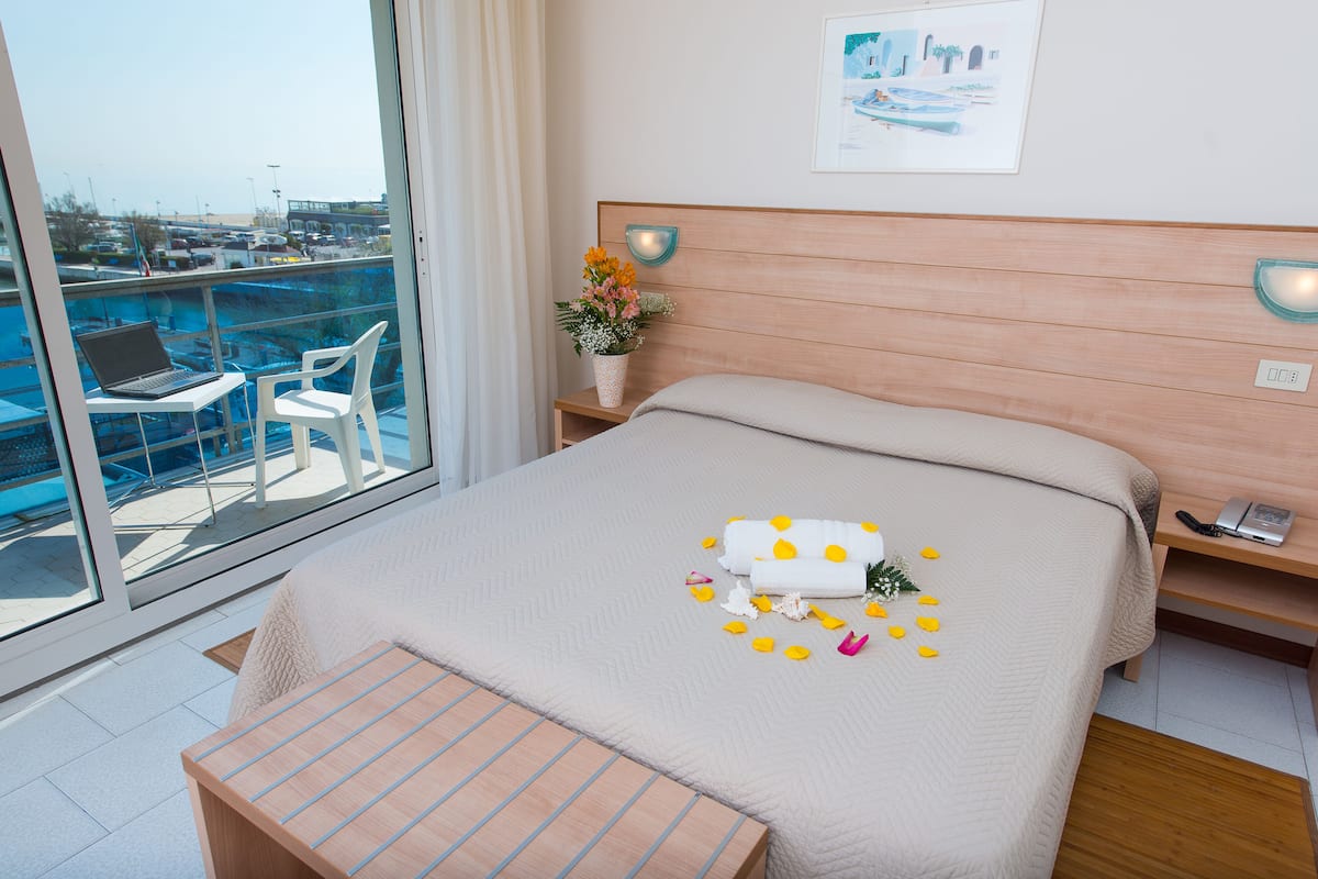 double or twin room | minibar, in-room safe, desk, laptop workspace