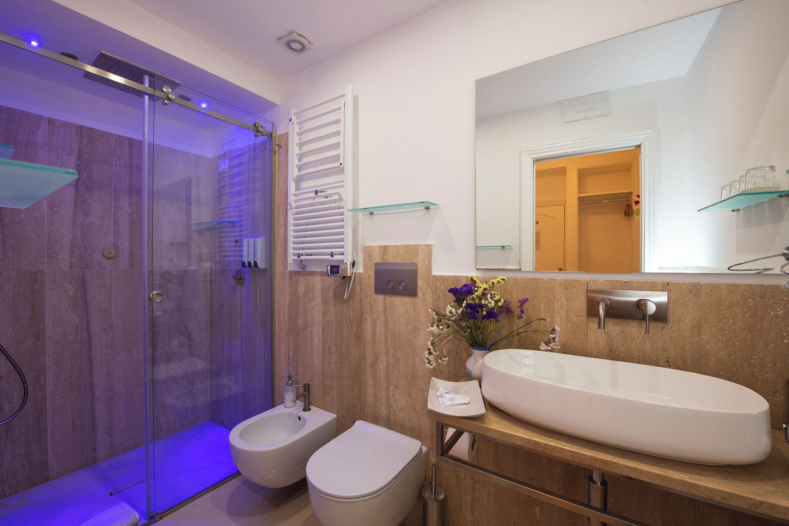 junior studio suite, 1 bedroom, balcony, city view | bathroom | shower, rainfall showerhead, free toiletries, hair dryer