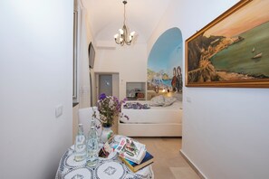 Suite familiale, 1 chambre, balcon, vue sur la ville | 1 chambre, draps italiens de Frette, literie de qualité