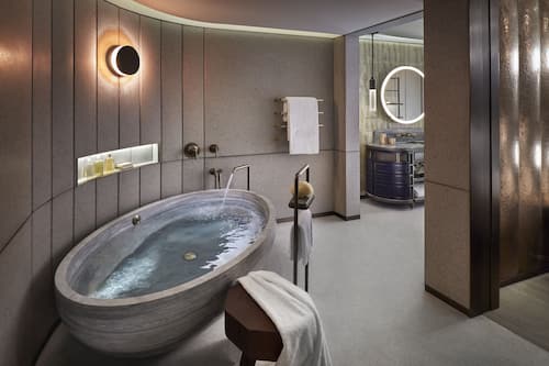 Suite (Entertainment) | Bathroom | Separate tub and shower, deep soaking tub, rainfall showerhead