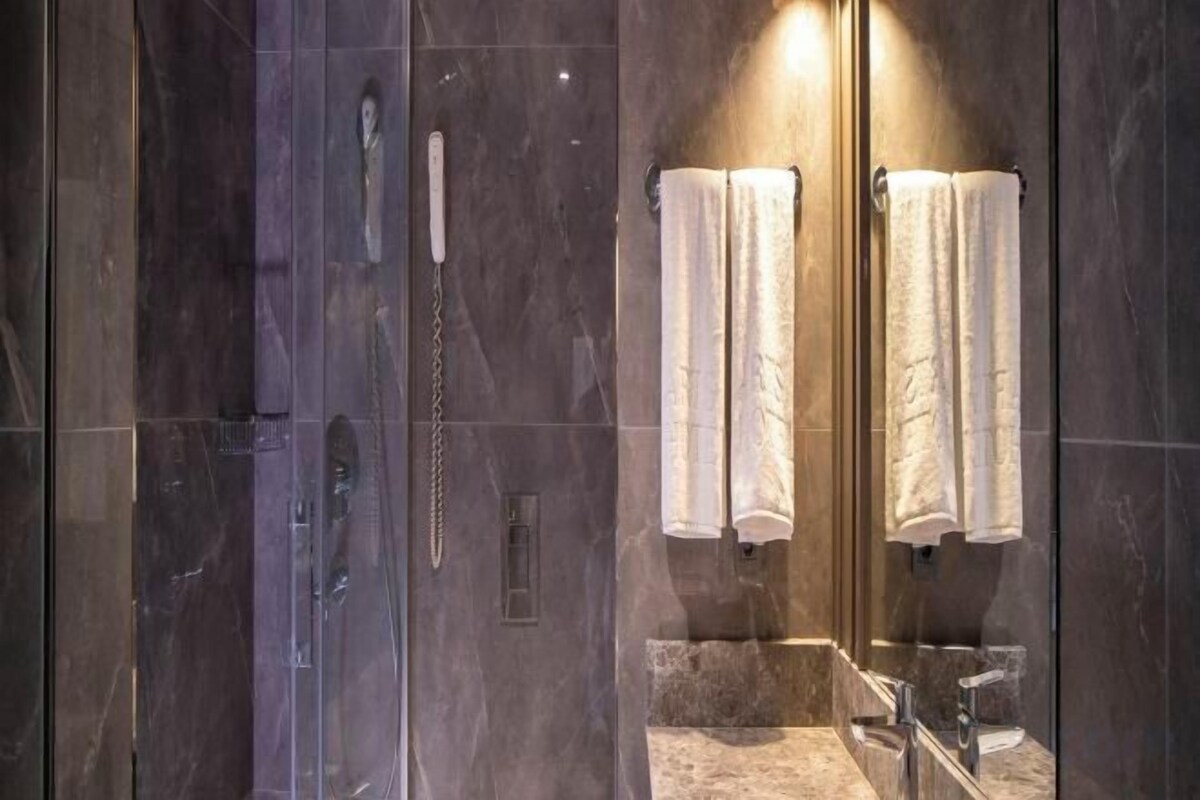 Bathroom | Shower, free toiletries, hair dryer, slippers