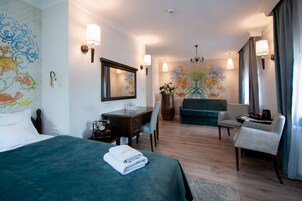 Deluxe Double Room | Living area | LCD TV