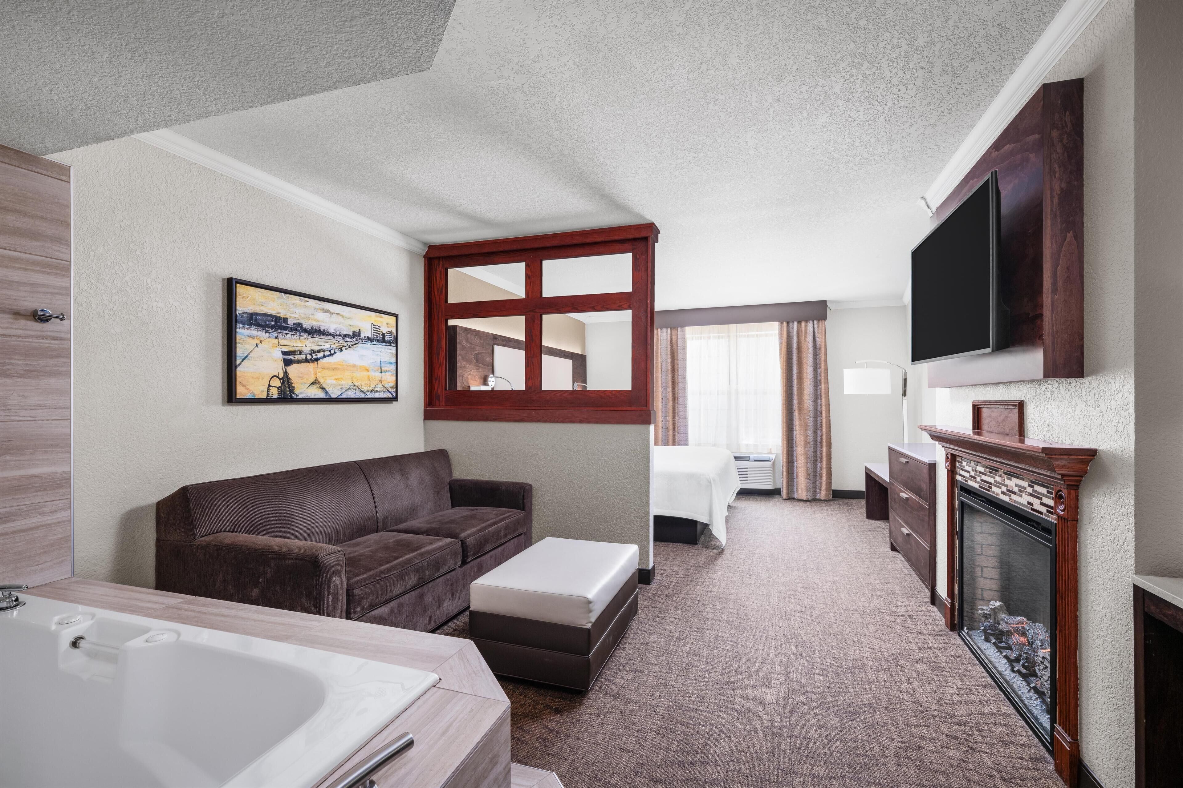 Suite, 1 King Bed, Non Smoking, Jetted Tub (with Sofabed) | Premium bedding, in-room safe, desk, laptop workspace