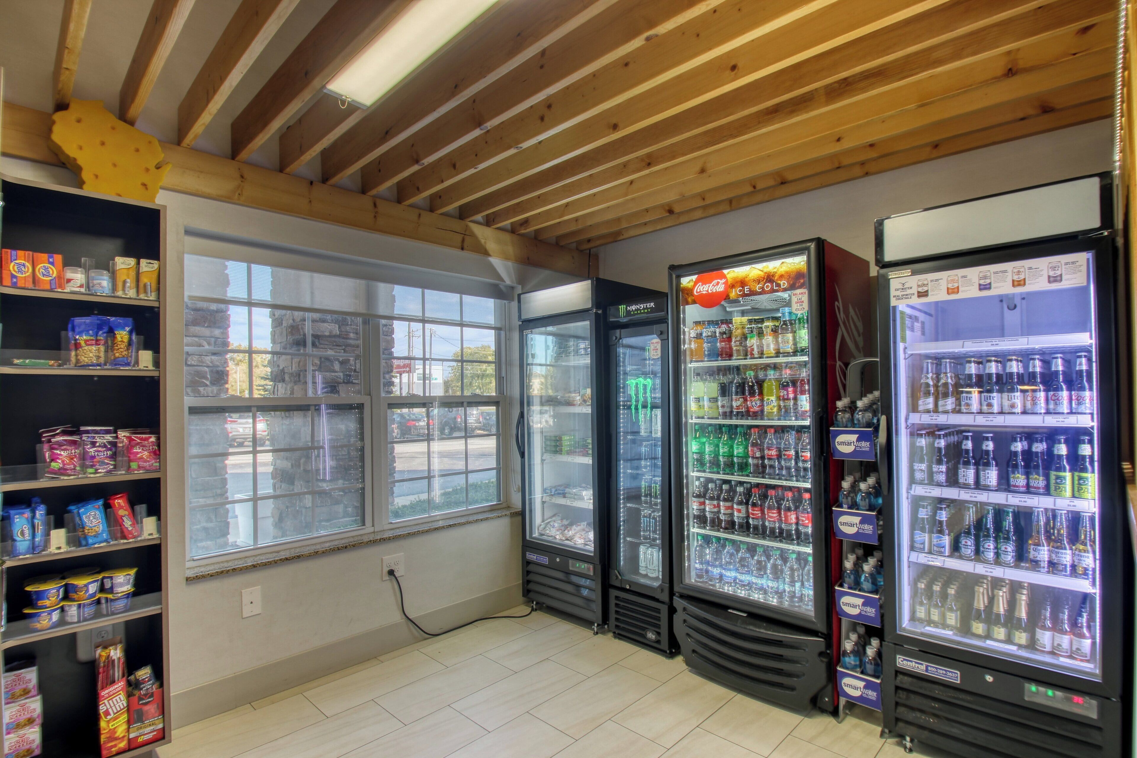 A small convenience store with a variety of snacks, drinks, and beverages.