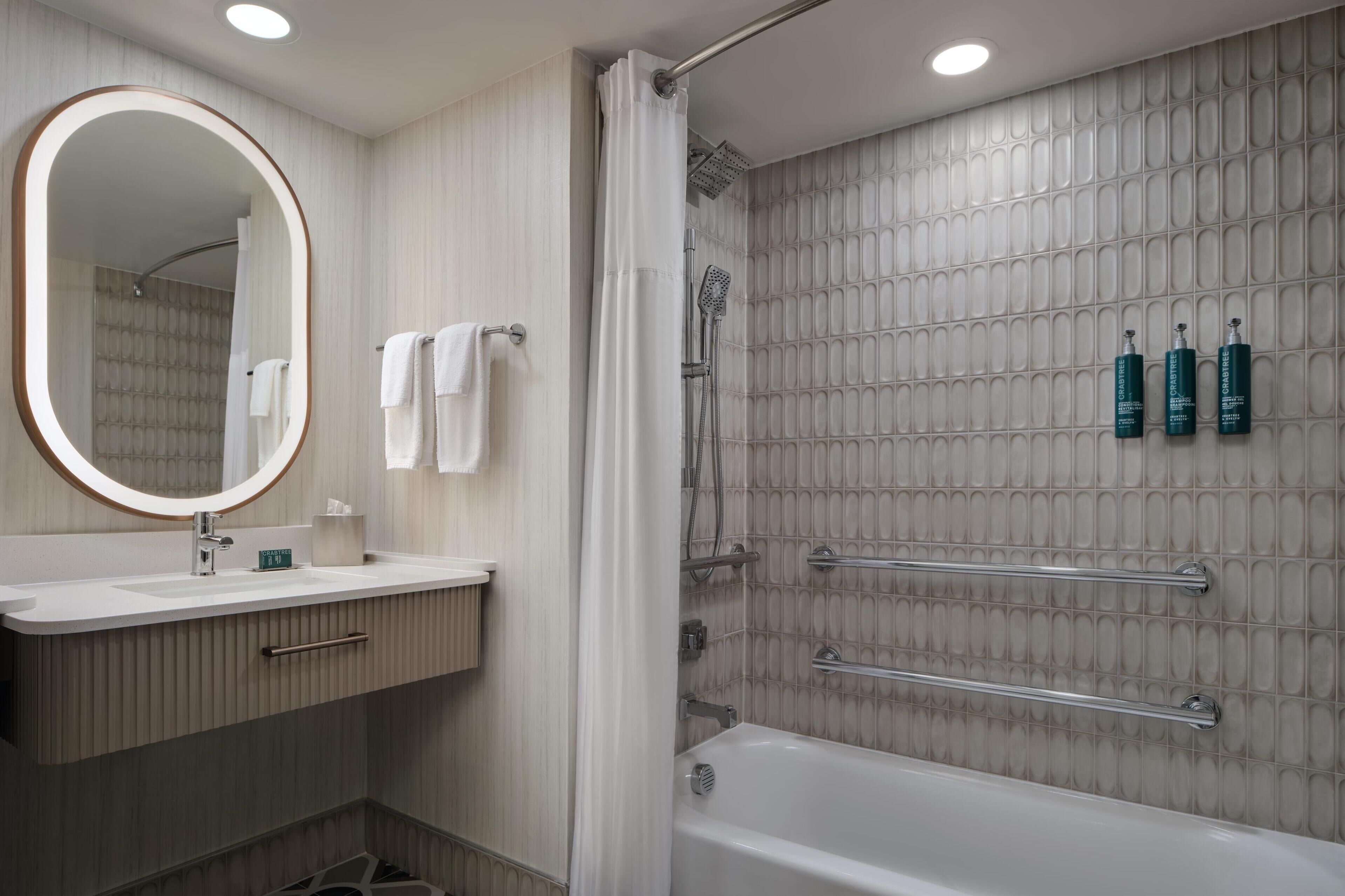 combined shower/bathtub, free toiletries, hair dryer, towels