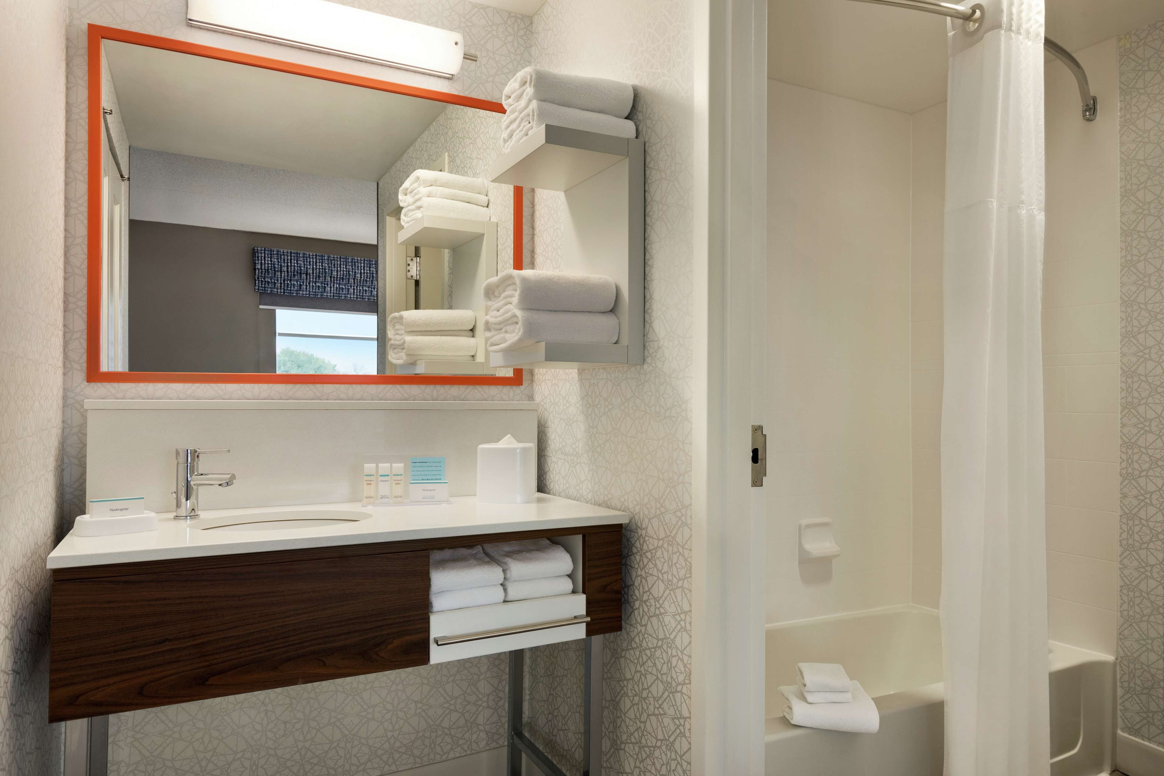 combined shower/bathtub, free toiletries, hair dryer, towels