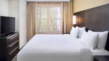 Hypo-allergenic bedding, pillow-top beds, desk, blackout curtains