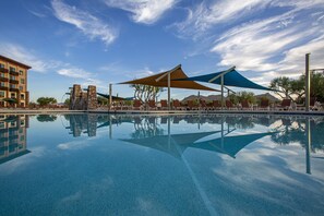Outdoor pool, open 7:00 AM to 11:00 PM, pool umbrellas, sun loungers