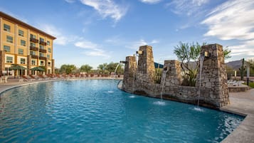 Outdoor pool, open 7:00 AM to 11:00 PM, pool umbrellas, pool loungers