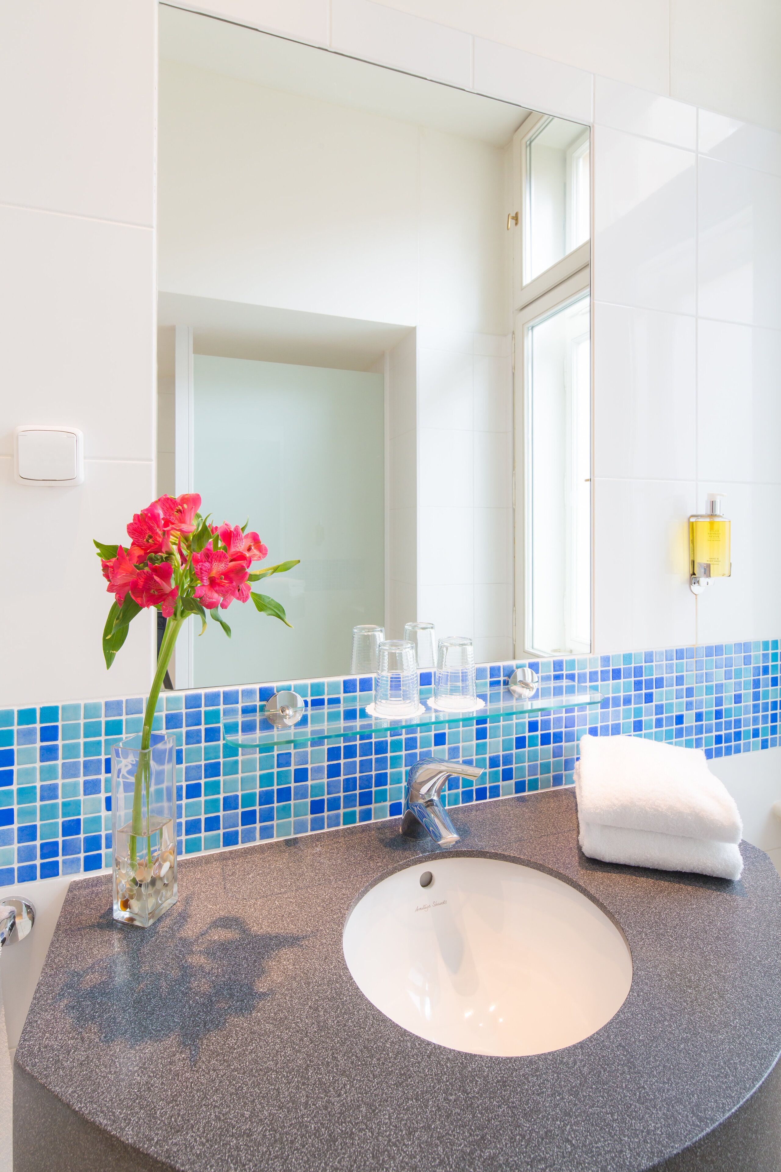 shower, free toiletries, hair dryer, towels