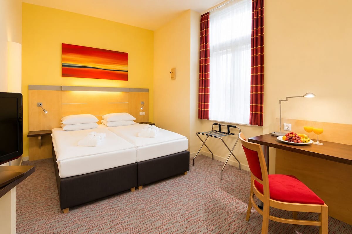 Premium bedding, desk, soundproofing, iron/ironing board (on request)