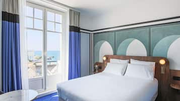 デラックス ルーム ダブルベッド 1 台 オーシャンビュー | ミニバー、セーフティボックス (室内)、デスク、遮光カーテン