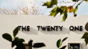 A building facade with the text "THE TWENTY ONE" prominently displayed. - The Twentyone (Kifisia)