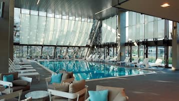 Indoor pool, open 6:30 AM to 10 PM, pool umbrellas, sun loungers