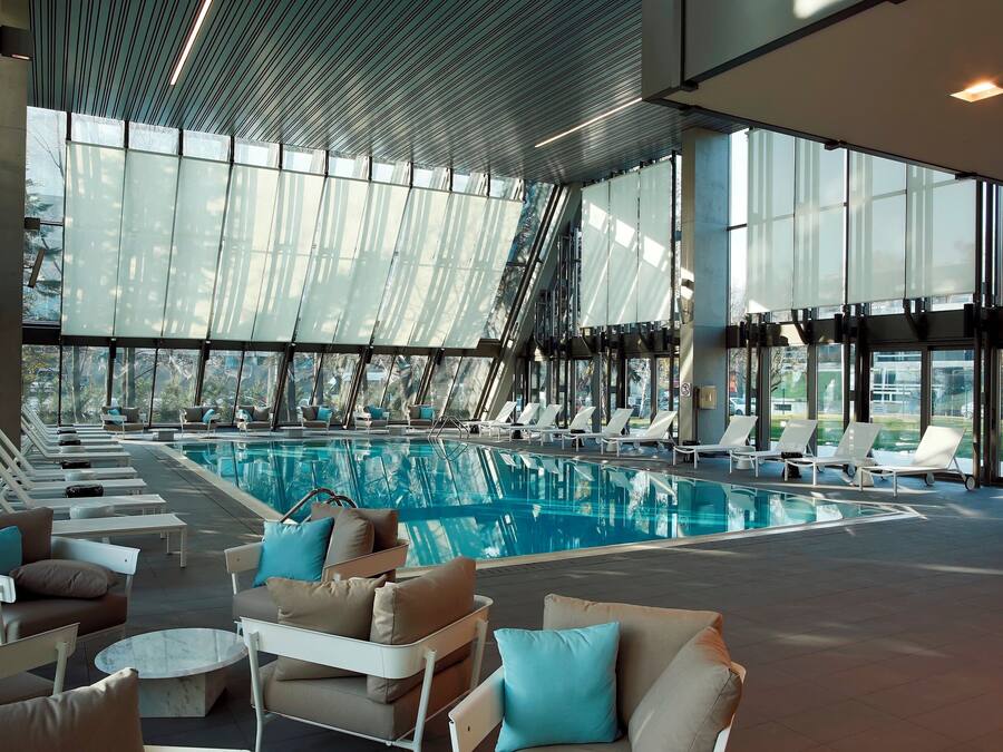 Indoor pool, open 6:30 AM to 10 PM, pool umbrellas, sun loungers