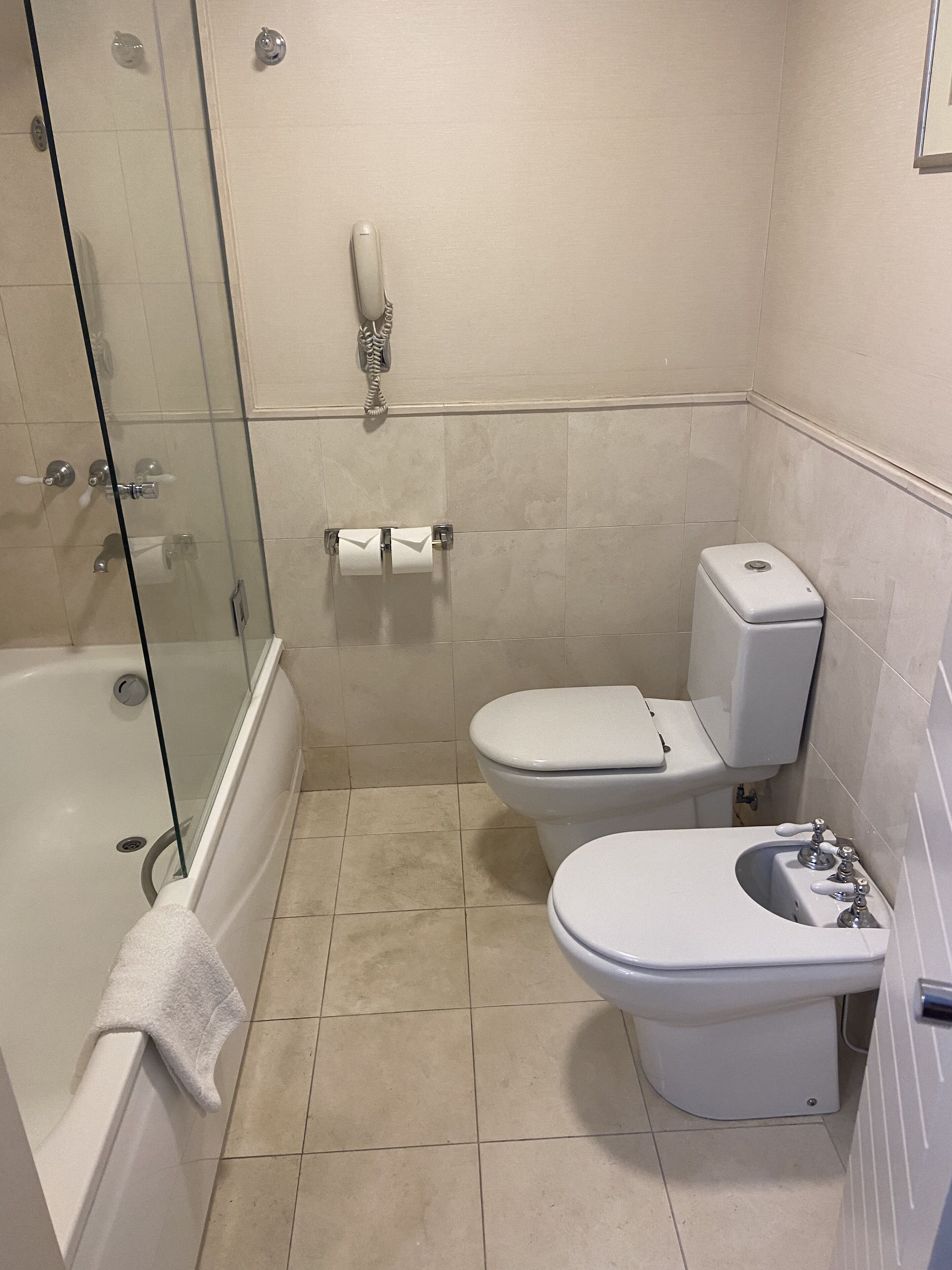 deep-soaking bathtub, rainfall showerhead, free toiletries, hair dryer