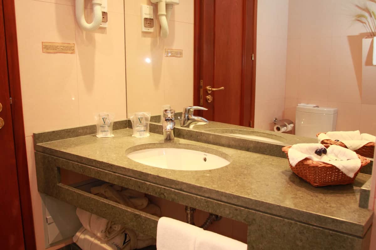 family twin room | bathroom | shower, designer toiletries, hair dryer, bathrobes