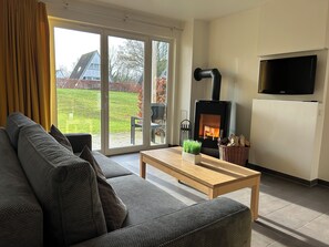 Maison Premium, 2 chambres, cheminée | Coin séjour | Baby-foot, table de tennis de table