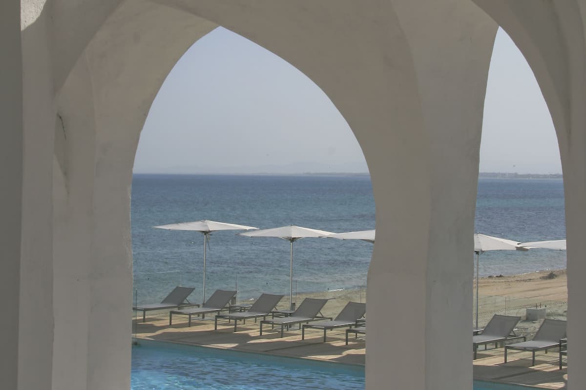 private beach, white sand, sun-loungers, beach umbrellas