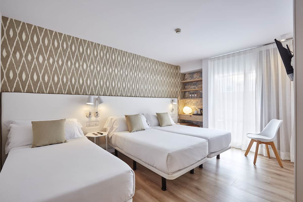 Minibar, in-room safe, iron/ironing board (on request), free WiFi
