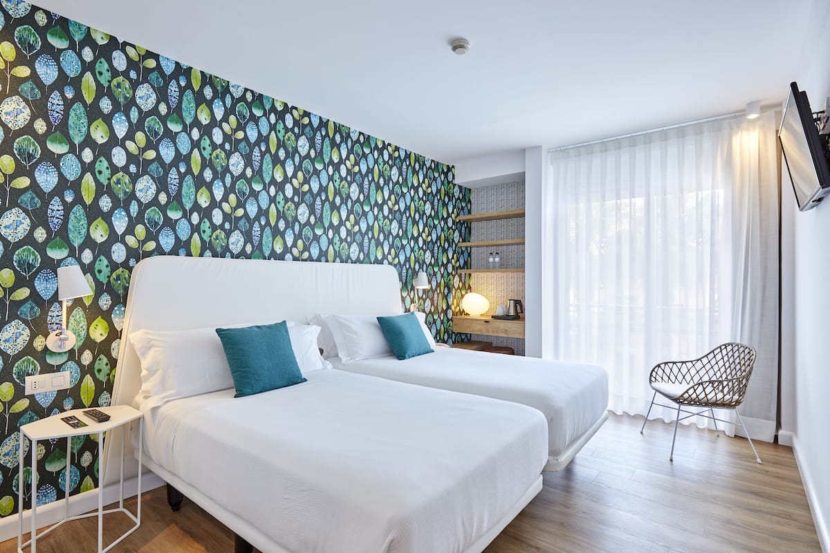 Comfort Double Room, Pool View | Minibar, in-room safe, iron/ironing board, free WiFi