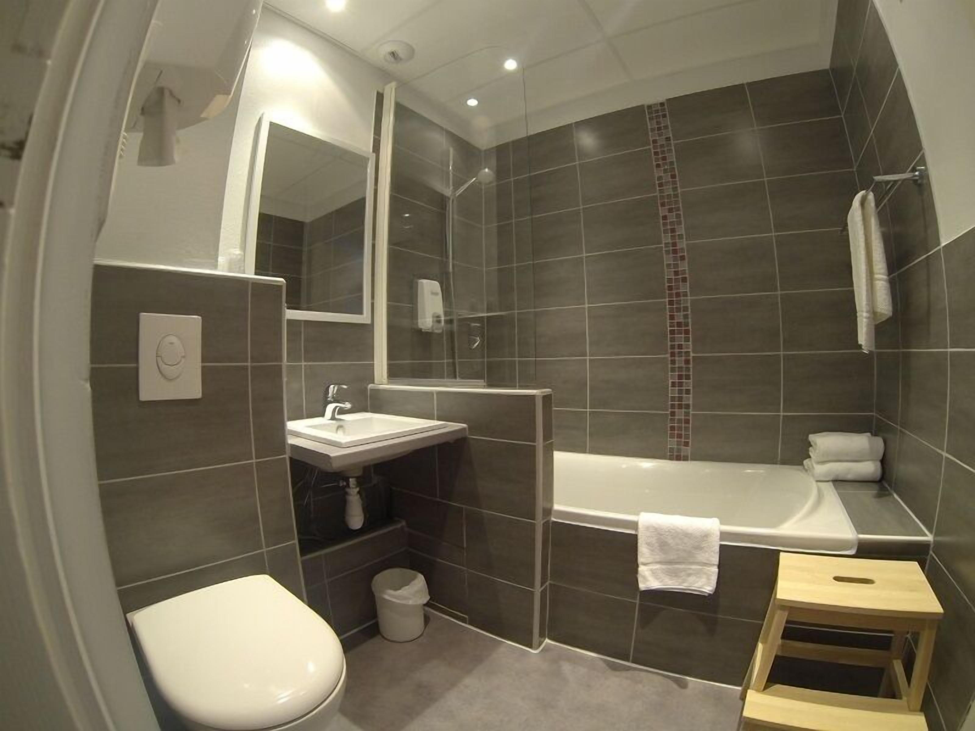 suite, bathtub | bathroom | shower, hair dryer, towels