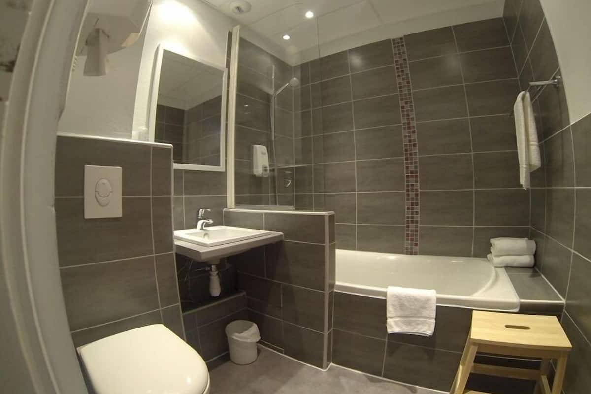 suite, bathtub | bathroom | shower, hair dryer, towels
