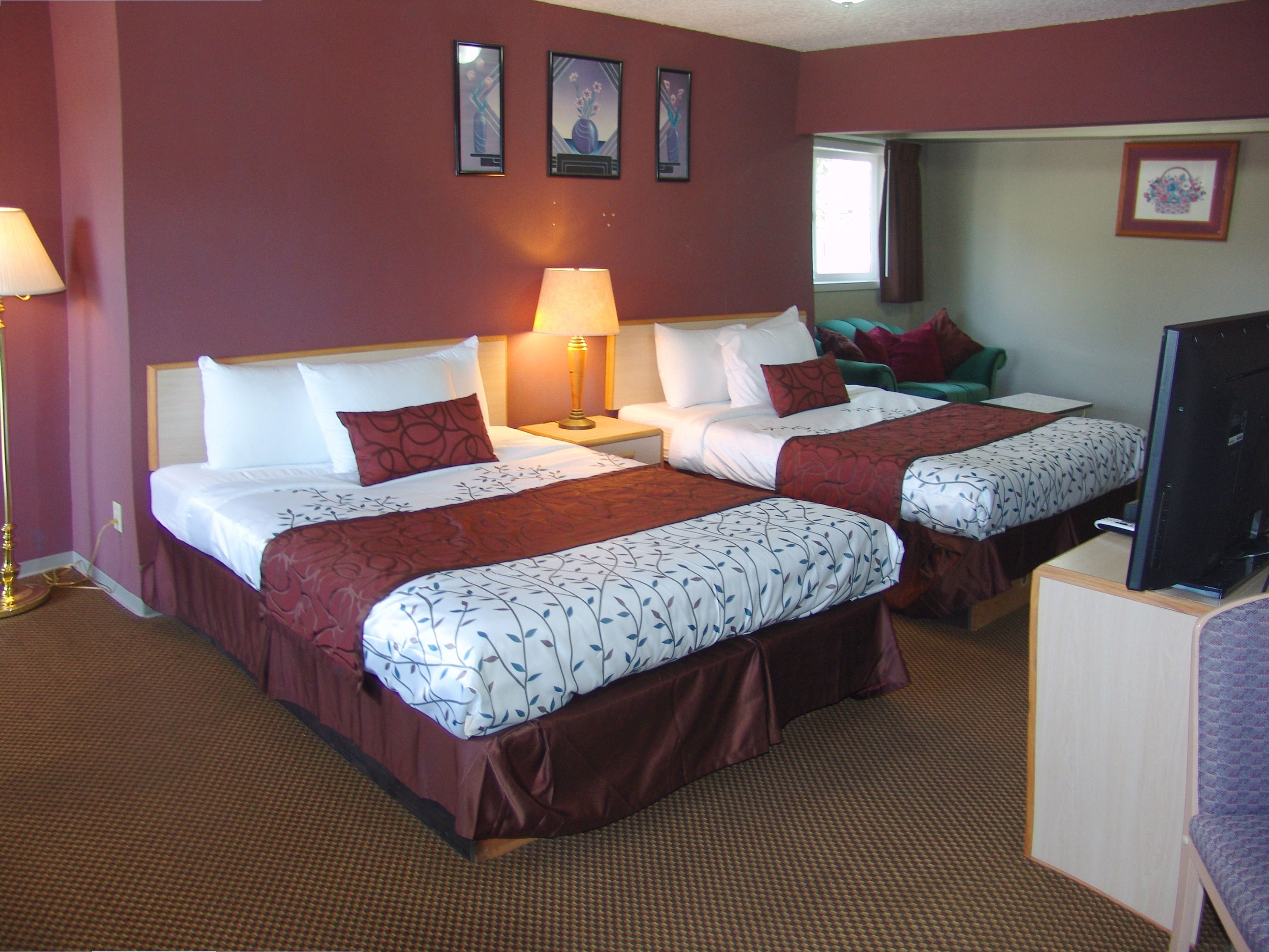 Standard Room, 2 Queen Beds, Non Smoking | Individually furnished, blackout drapes, iron/ironing board, free WiFi