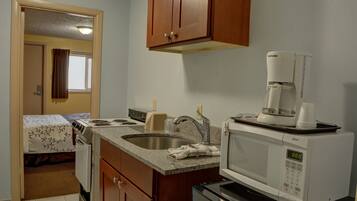 Standard Room, 2 Queen Beds, Non Smoking | Private kitchen | Fridge, microwave, coffee/tea maker