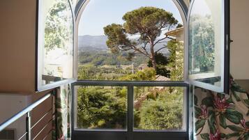 Family Duplex, 1 Bedroom, Kitchen, Poolside | Minibar, in-room safe, desk, iron/ironing board