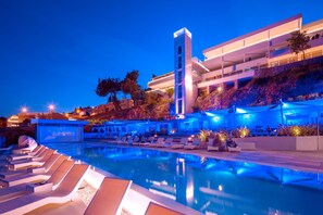 Seasonal outdoor pool, pool umbrellas, pool loungers